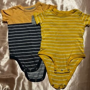 Two stripped onesies 💛